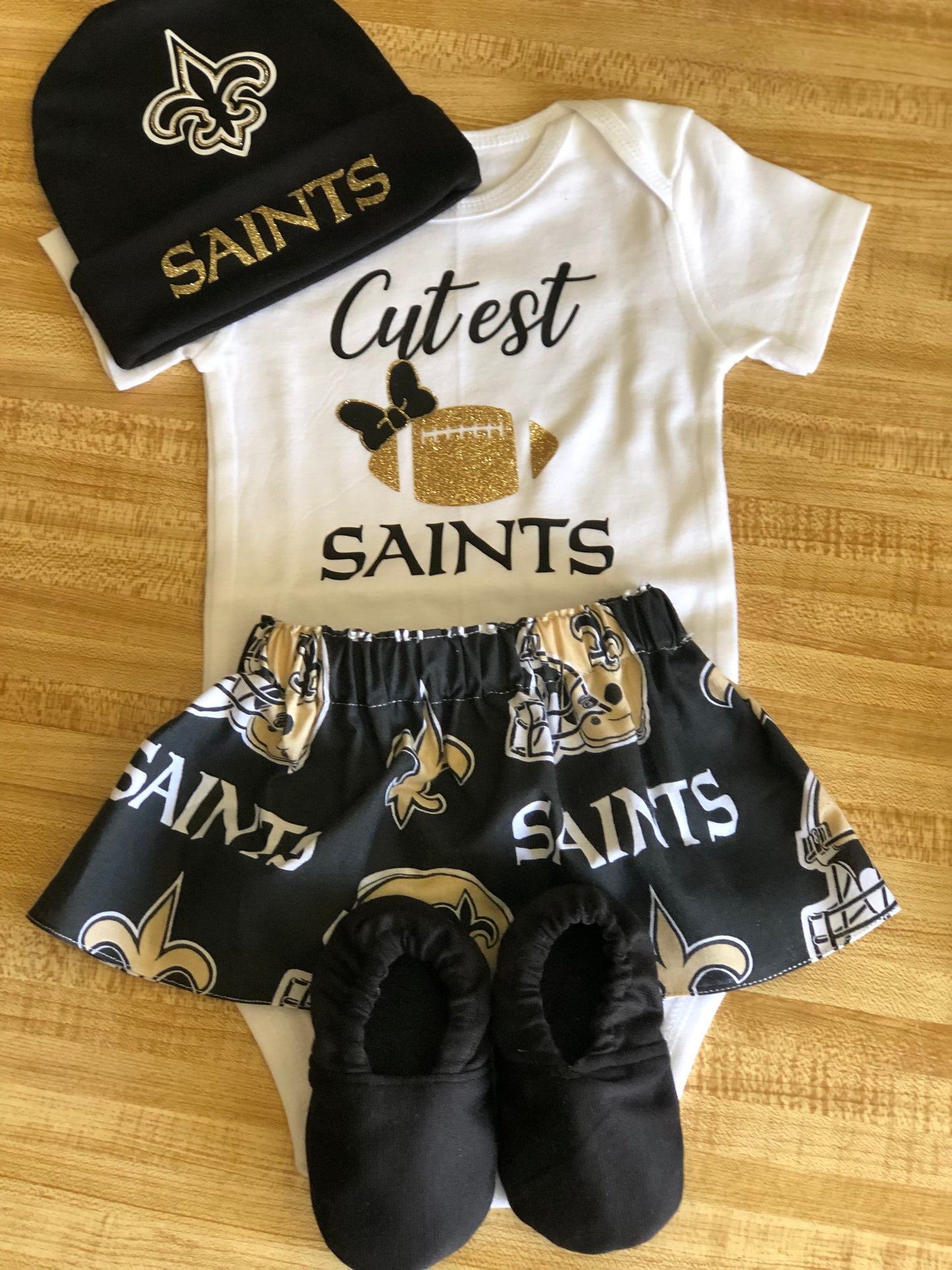 Adorable Saints Football Baby Outfit - Perfect for New Orleans Saints Fans - Great for a Football-Themed Baby Shower Gift